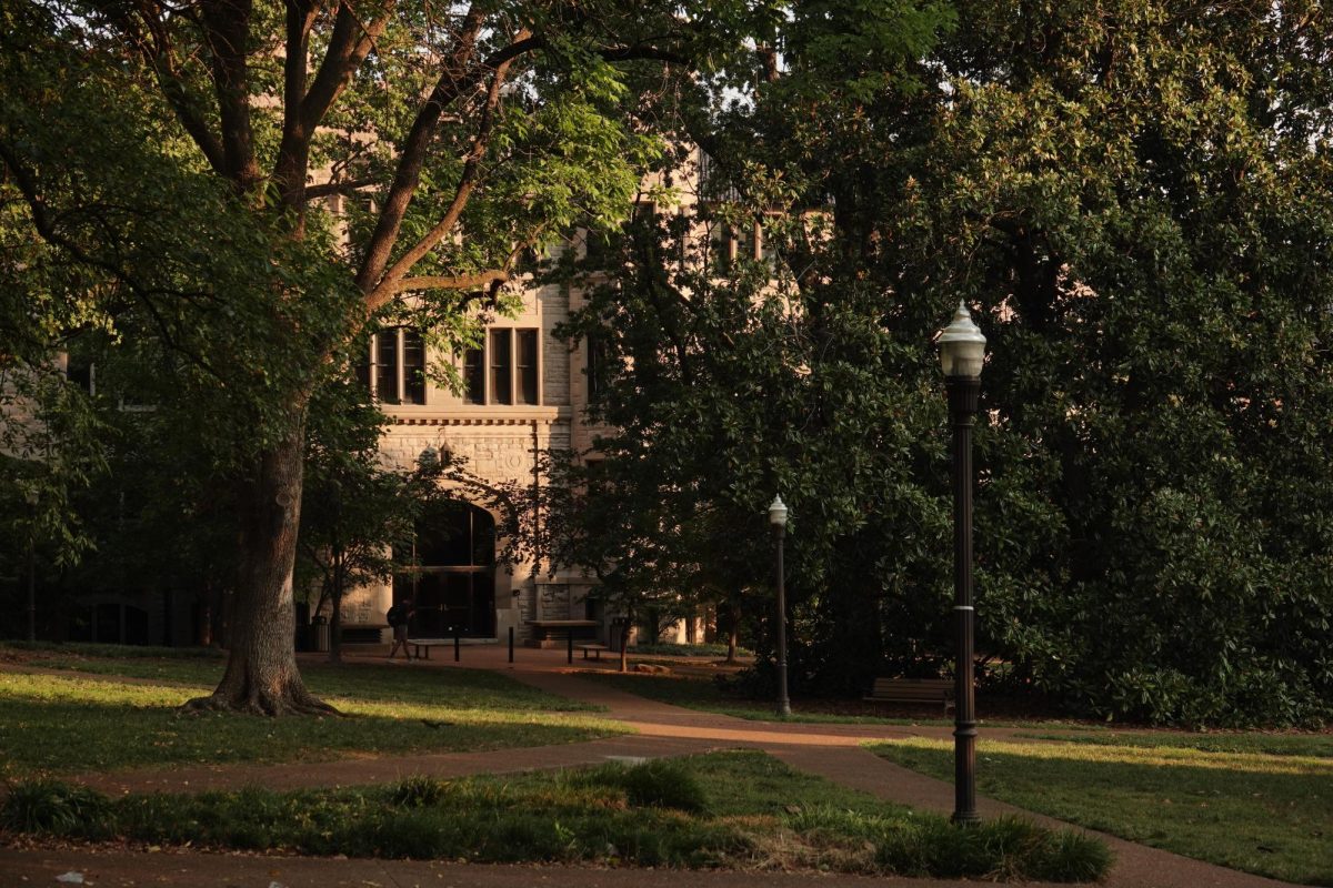 A student walks past Furman Hall on a sunny day, as photographed Sept. 10, 2025. (Hustler Multimedia/Corey Lochan)