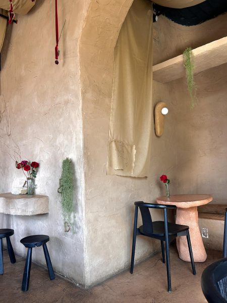 Cafe Babu’s interior includes tables, chairs, rose decorations and more, as photographed Feb. 11, 2026. (Hustler Staff/ Daniela Aguilar) 