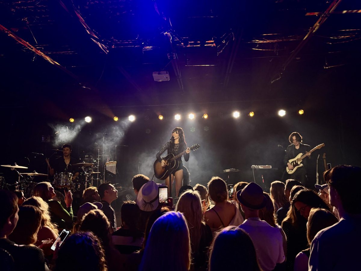 Syd Taylor performs with her full band as the crowd gathers at the front of the stage, as photographed Feb. 27, 2026. (Hustler Multimedia/Naomi Wang)