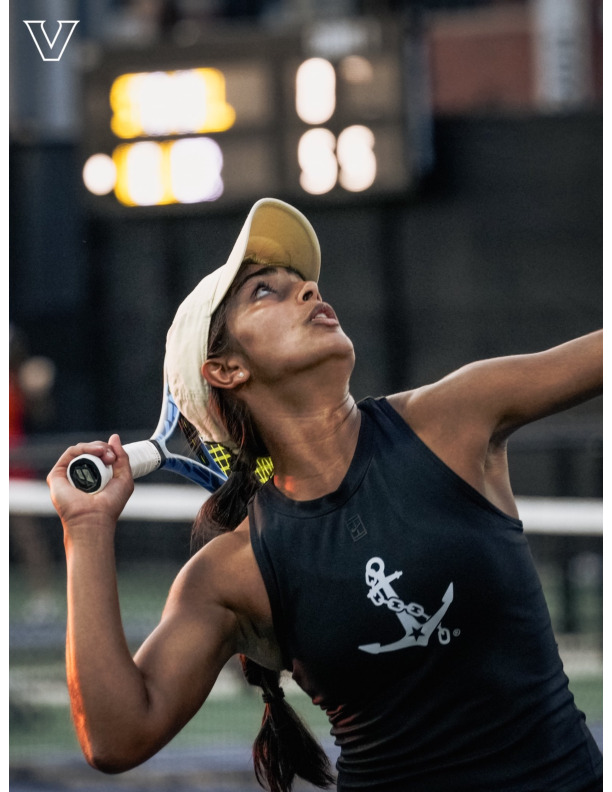 Trinetra Vijayakumar prepares to serve, as photographed March 19, 2026. (Vanderbilt Athletics).