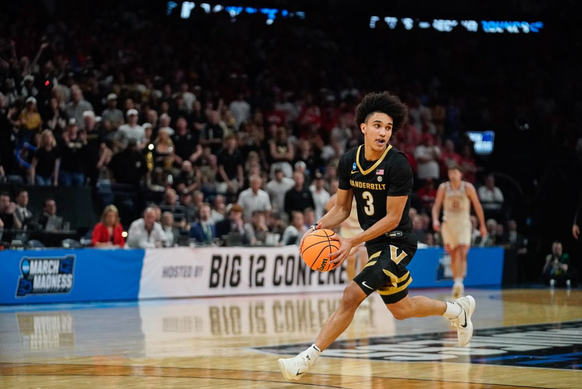 Tyler Tanner dribbles the ball on a fastbreak, as photographed on March 21, 2026. (Hustler Multimedia/Michael Tung)