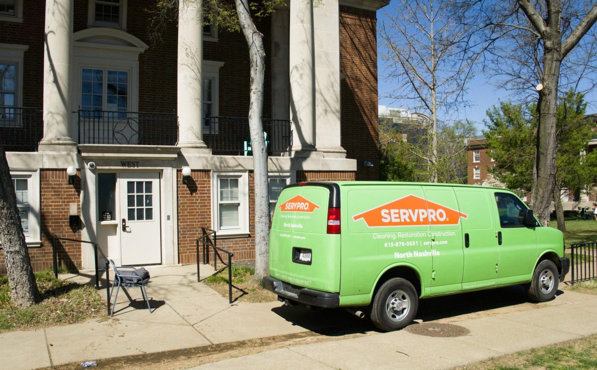 A green Servpro van stands parked next to the flooded West House, as photographed March 28, 2026. (Hustler Multimedia/George Albu)