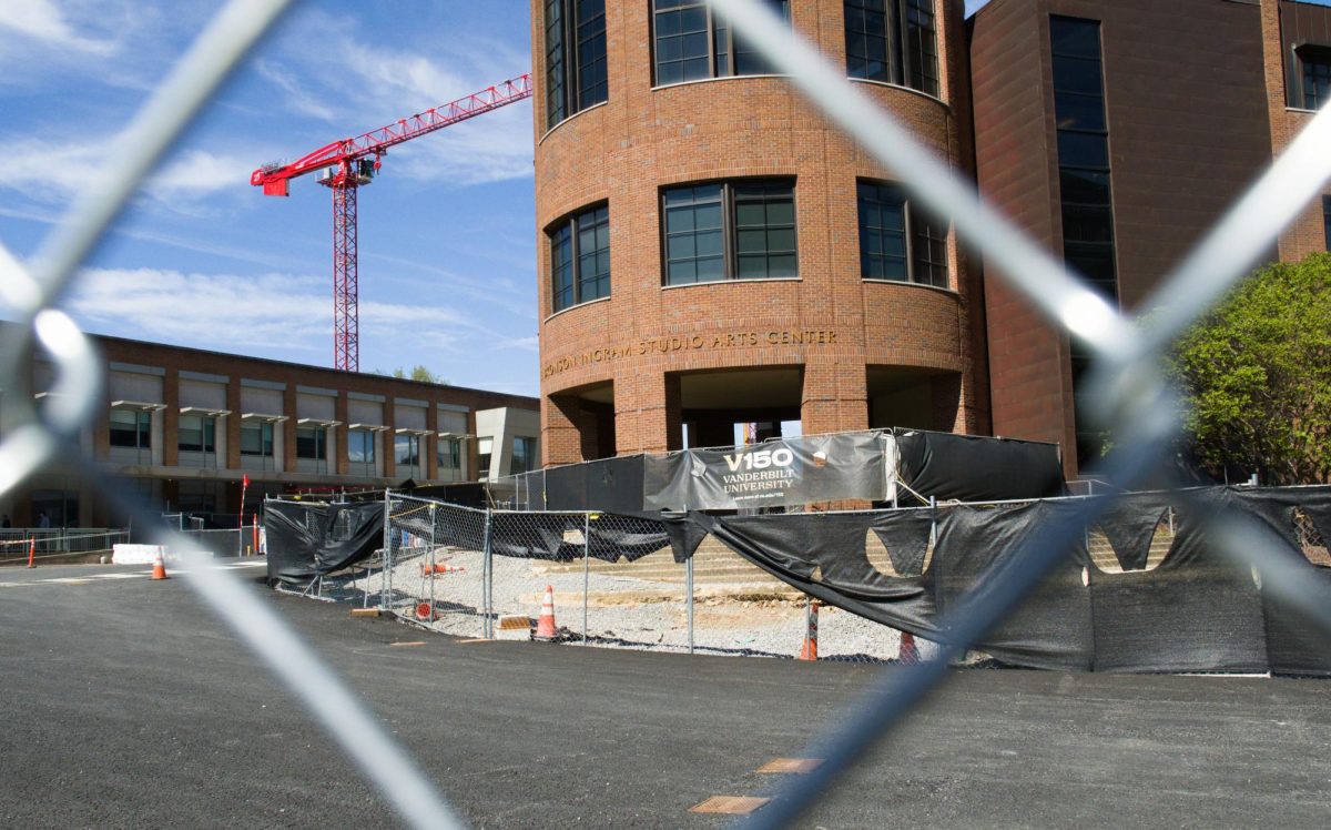 E. Bronson Ingram Studio Arts Center sub framed through a construction chain link fence on a sunny day, as photographed April 5, 2026. (Hustler Multimedia/George Albu)