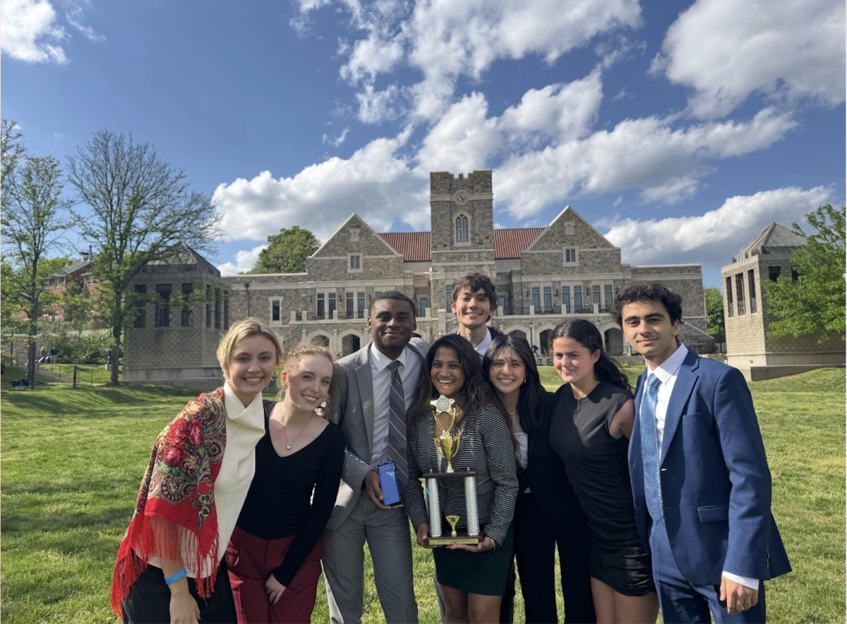 Vanderbilt Mock Trial holds its trophy after earning ninth place at the American Mock Trial Association National Championship Tournament, as photographed April 19, 2026. (Photo courtesy of Anavi Jain)