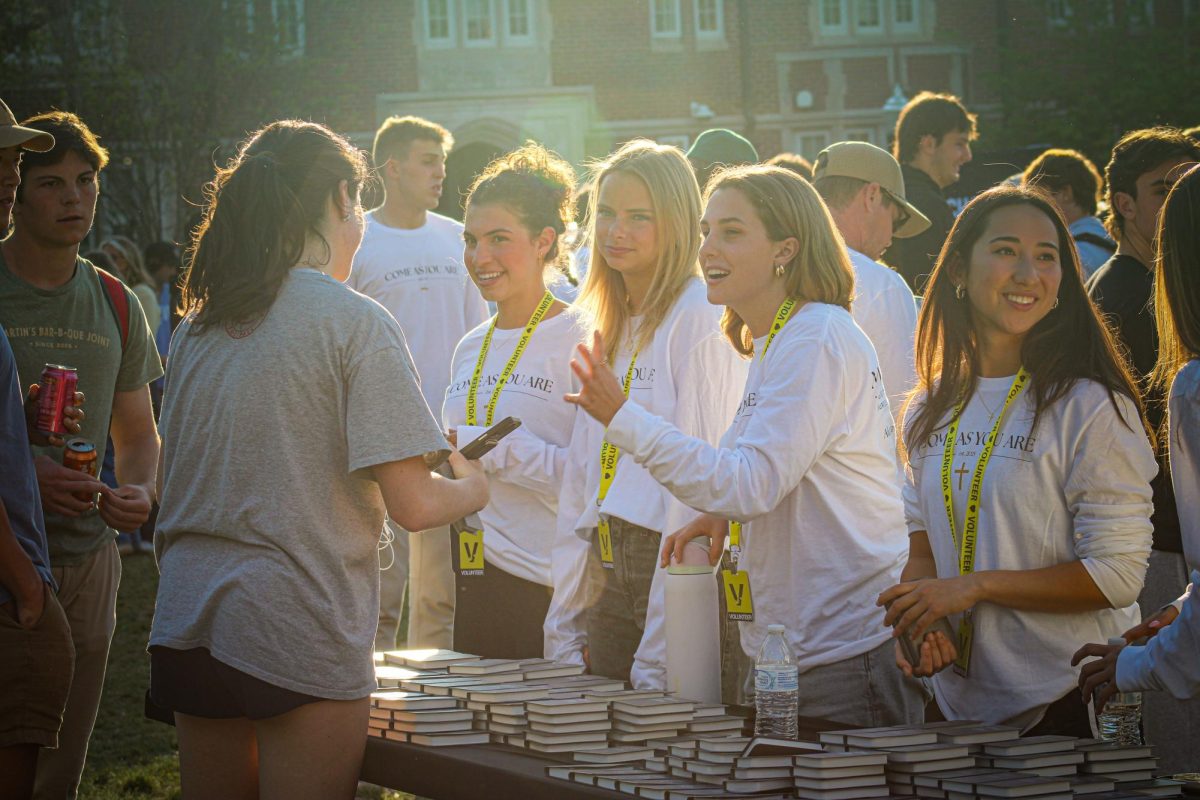 Attendees worship on Alumni Lawn, as photographed April 6, 2026. (Hustler Multimedia/Rachel Loomis)