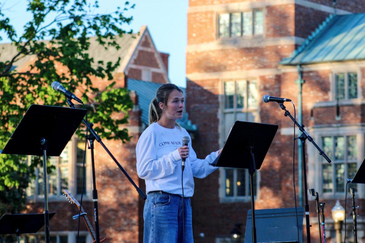 Hundreds of students packed onto Alumni Lawn for “Come As You Are,” a Christian campus event of worship featuring student guest speakers.