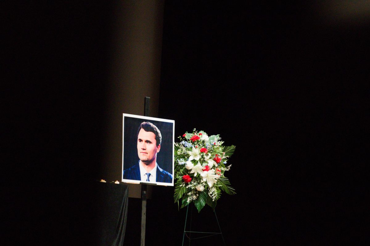 A portrait of Charlie Kirk next to a wreath of flowers, as photographed Sept. 17, 2025. (Hustler Multimedia/George Albu)