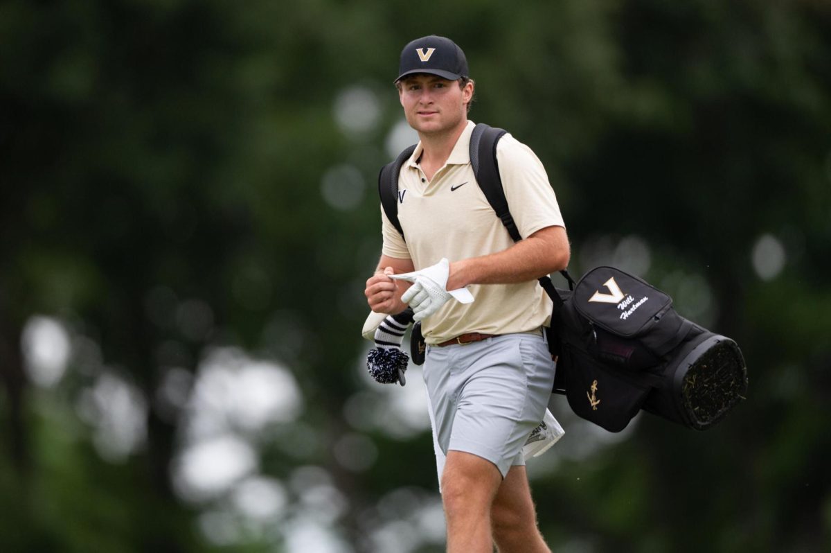 Will Hartman removes his glove, as photographed May 20, 2026. (Photo courtesy of Vanderbilt Athletics)