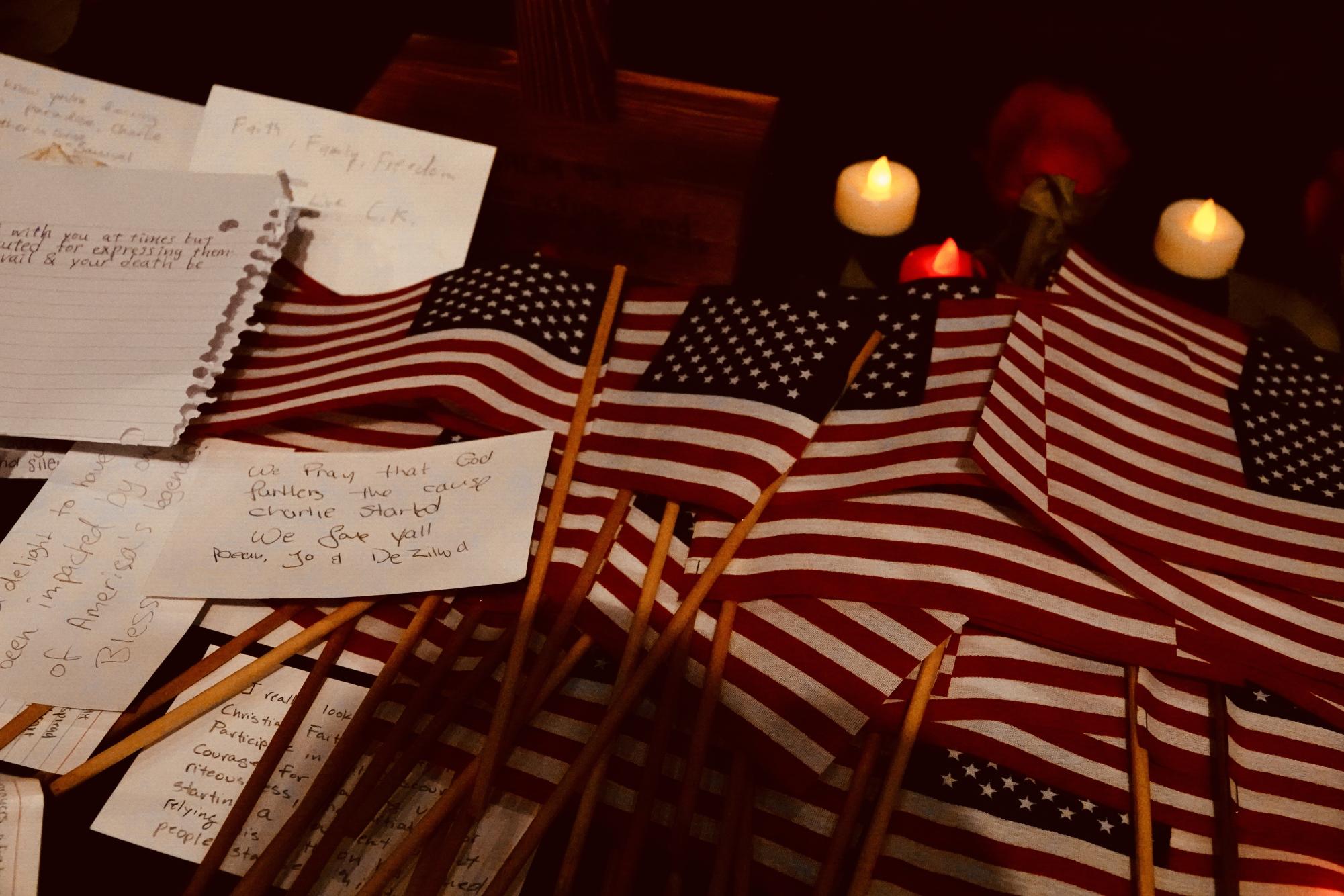American flags and notes to Kirk show support, as photographed Sept. 17, 2025. (Hustler Multimedia/Chloe Pryor)