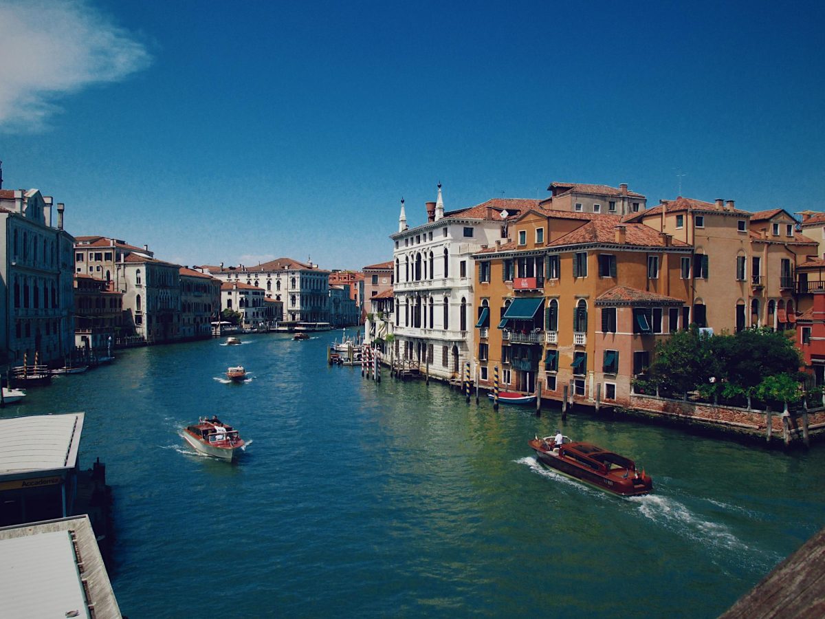 Boats are moored along a canal in Venice, Italy, as photographed May 28, 2026. (Angel Akpovi/Hustler Multimedia)